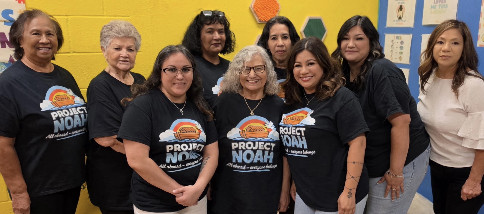 Project Noah volunteer team wearing matching Project Noah shirts in The Ark Room