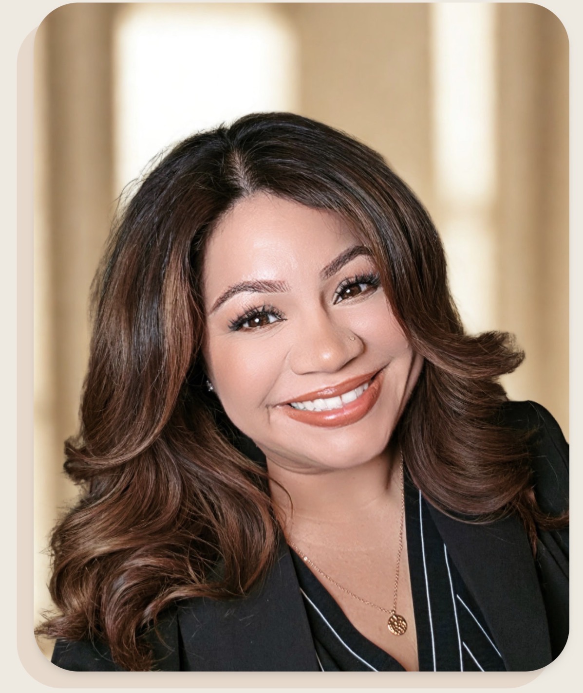 Nichole Garza, founder of Project Noah, smiling in a portrait